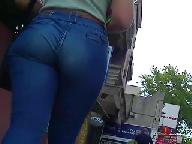 Incredibly HOT brunette with a PHAT ass in skintight jeans!